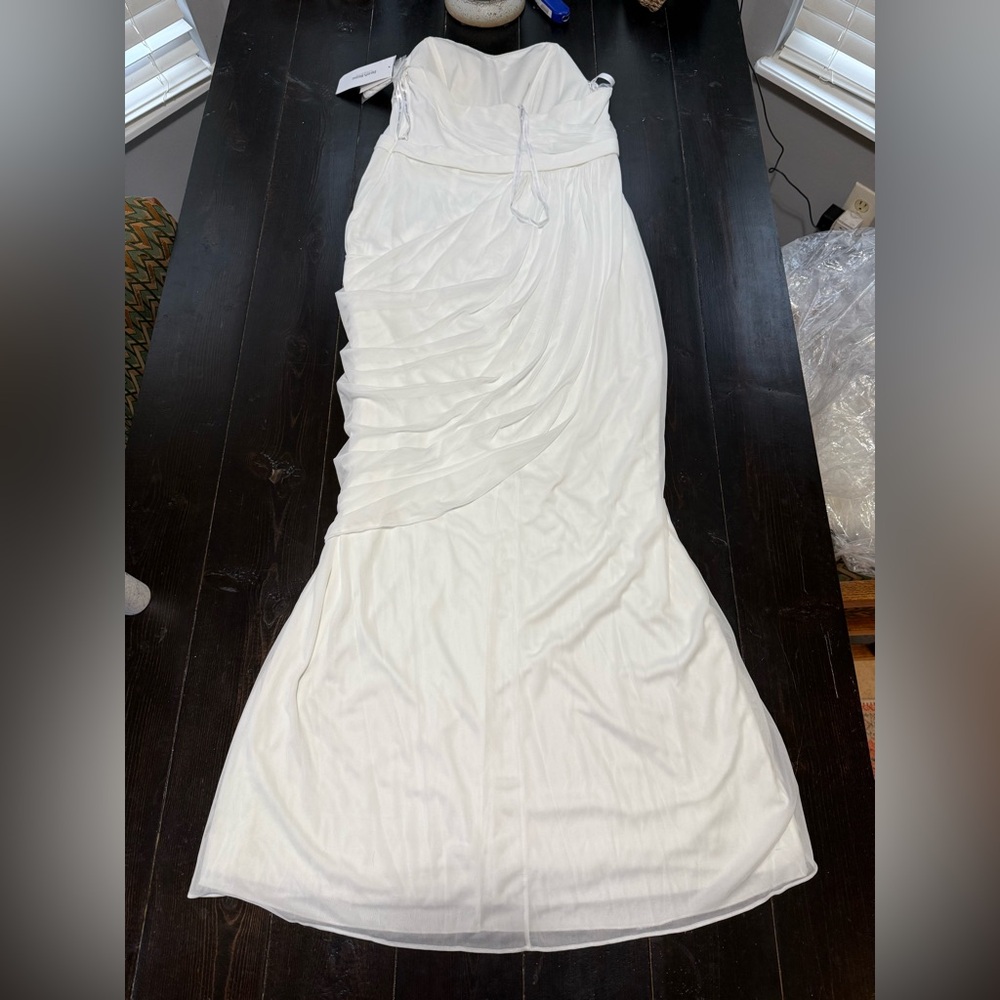 Brand new wedding dress, inexpensive but not cheap!